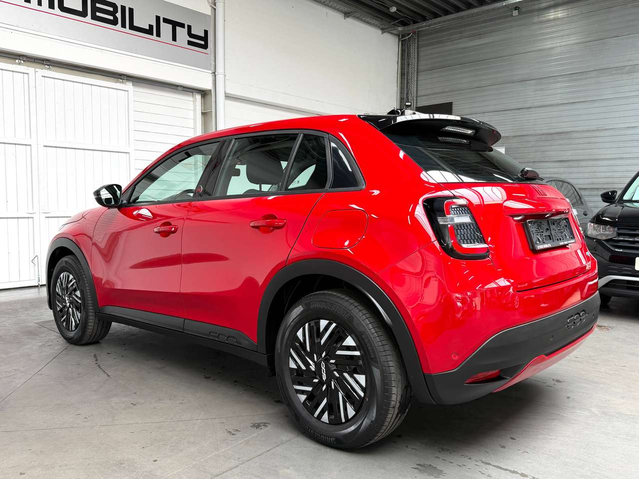 Fiat 600e e-600 54 kWh Red SOH 95% CARPLAY/ANDROID-AUTO*DAB*NAVI*CRUISE CONTROL*LANE ASSIST*PDC — foto 8 van 25