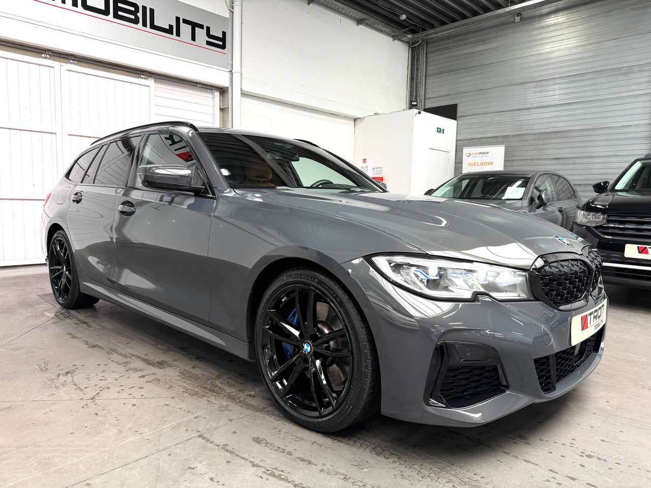 BMW 340 Touring M340d xDrive LICHTE VRACHT*M-SEATS*ACC*LASER*HEADUP*HARMANKARDON*360CAMERA — foto 7 van 25