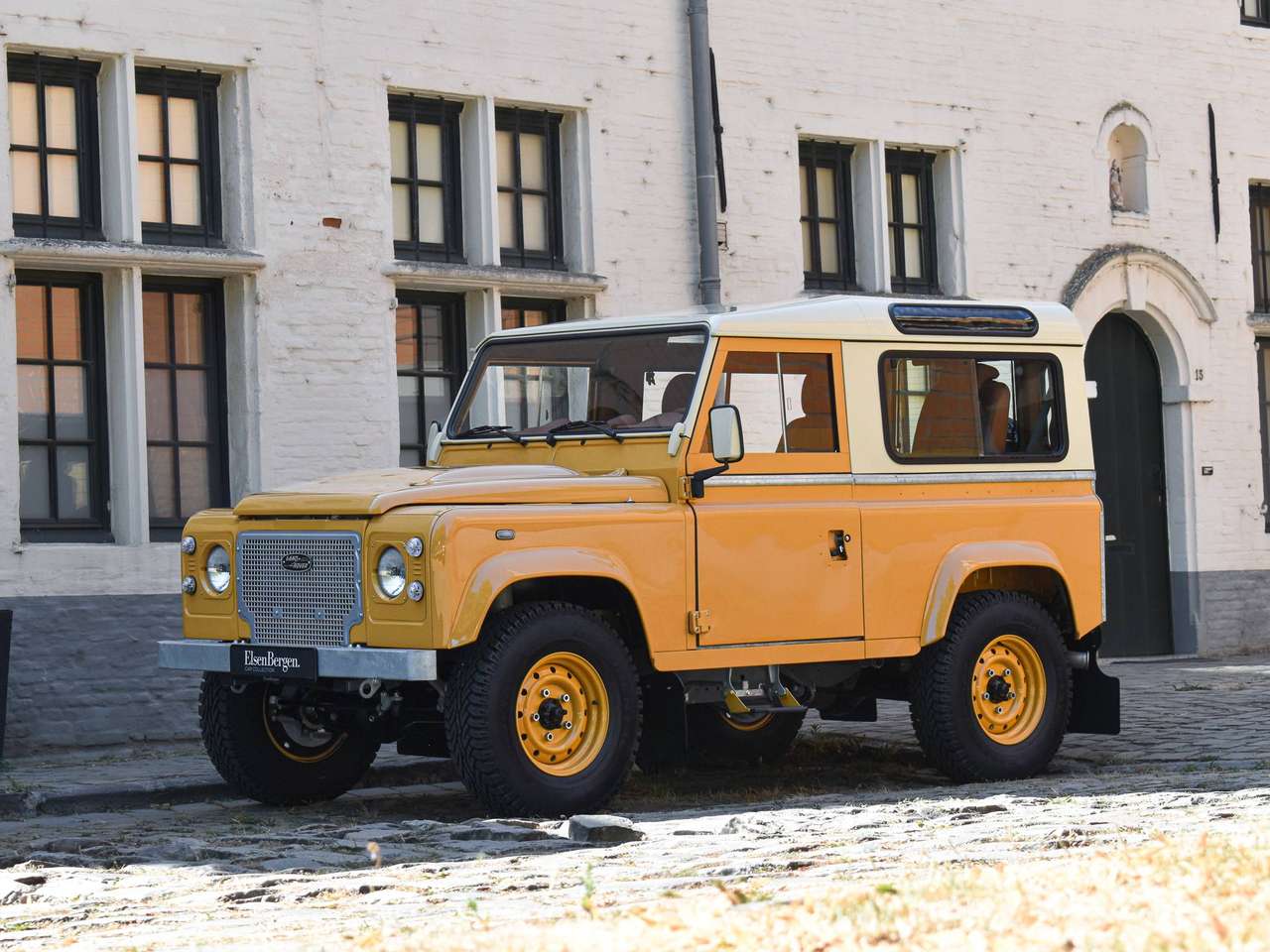 Land Rover Defender 90 / 2.2 TD4 / "Borrego Yellow Heritage" — foto 22 van 22