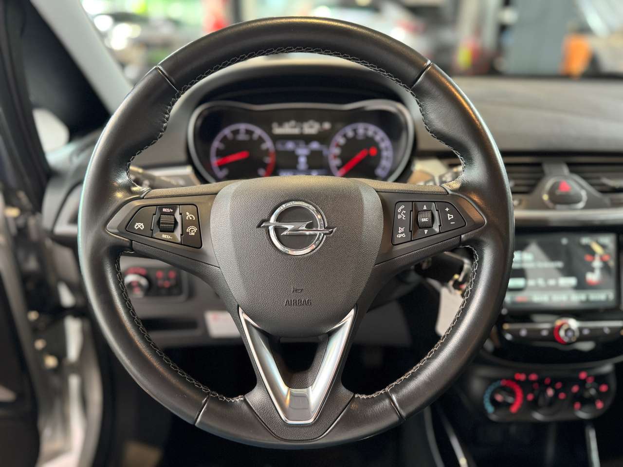 Opel Corsa 1.2i Enjoy met 12 maanden garantie! — foto 13 van 14