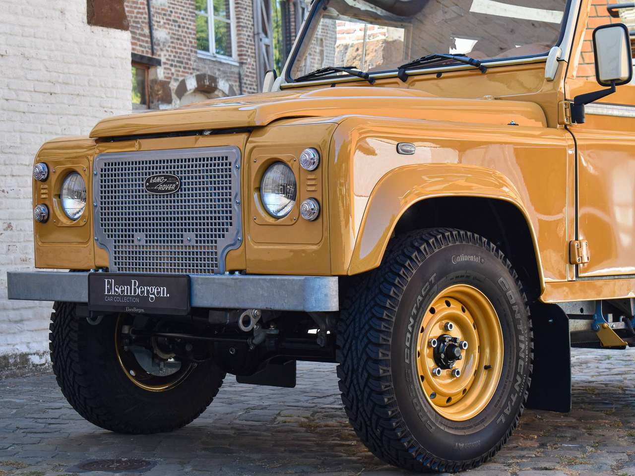 Land Rover Defender 90 / 2.2 TD4 / "Borrego Yellow Heritage" — foto 11 van 22