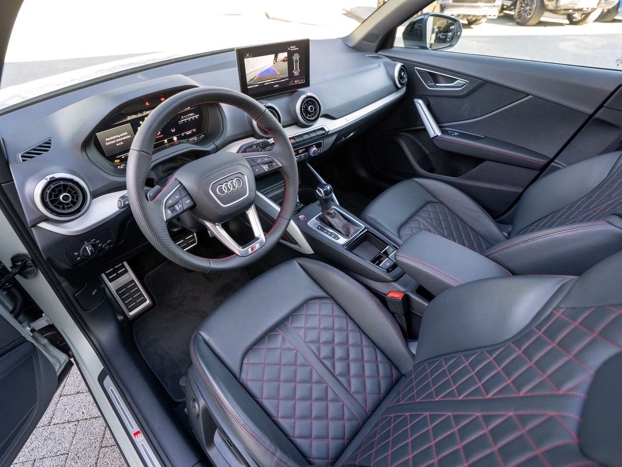 Audi SQ2 SQ2 - PANO/CAMERA/KEYLESS/MATRIX LED/APPLE CARPLAY/ACC/ZETELVERWARMING/ELEKTRISCHE KOFFER/GARANTIE 09.2029 — foto 14 van 21