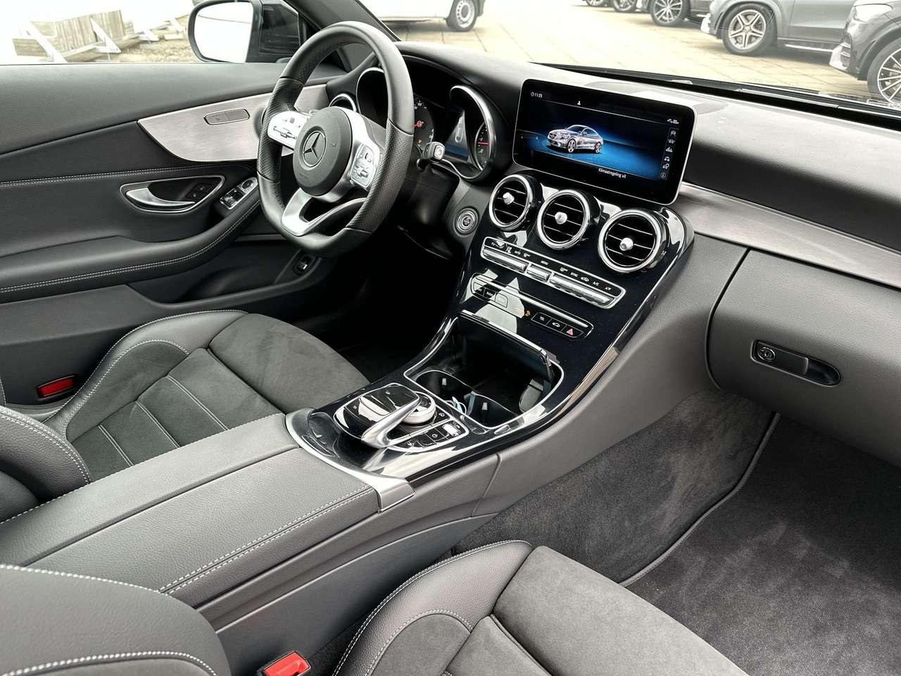 Mercedes-Benz C 180 COUPE AMG/PARKEERPAK/9G TRON/VERWARM ZETELS — foto 14 van 16