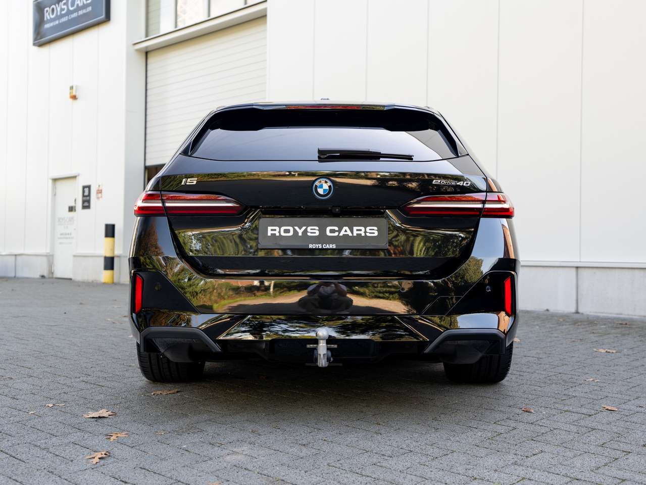 BMW i5 i5 Touring 83.9 kW eDrive40 - ACC/PANORAMA/TREKHAAK/HEAD-UP/KEYLESS/ZETELKOELING/360 CAMERA/HARMAN KARDON SOUND SYSTEM — foto 7 van 25