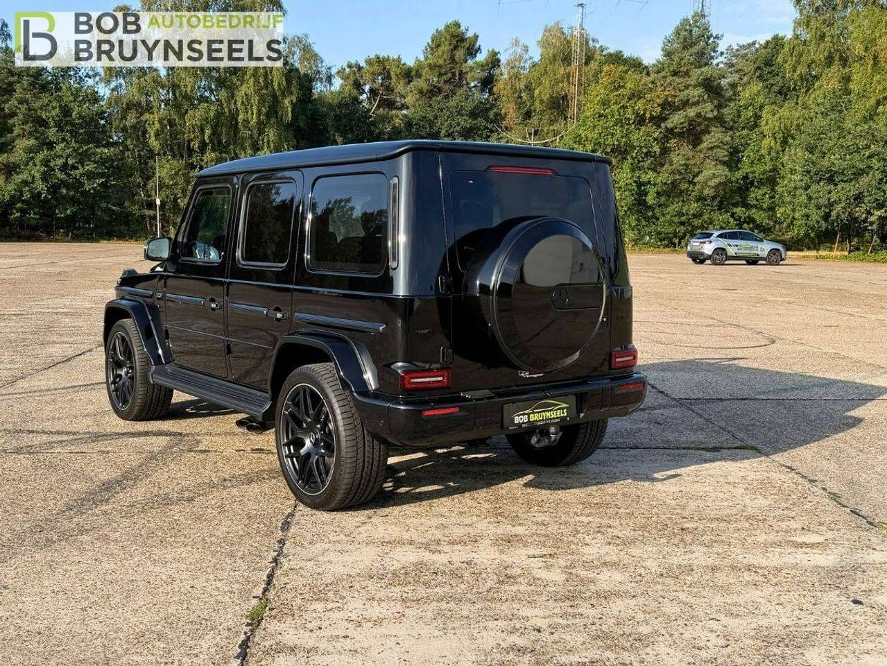 Mercedes-Benz G 63 AMG Nightpakket Plus – Schuifdak – Standverwarming – Trekhaak – 360° – Distronic — foto 2 van 25