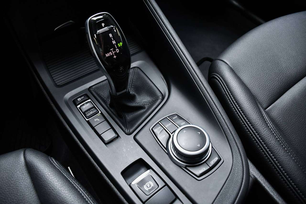 BMW X1 X1 1.5iA sDrive18i Automaat - LEDER / NAVIGATIE / CAMERA / PDC / CC — foto 14 van 18